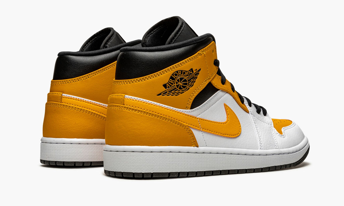 Jordan 1 Mid "University Gold" Sneakers