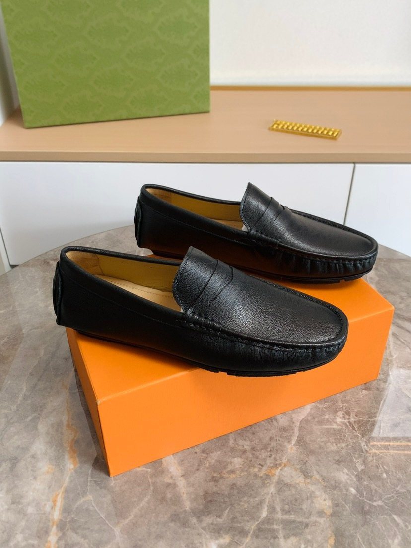 Louis Vuitton Black Moc-Toe Loafers — hero