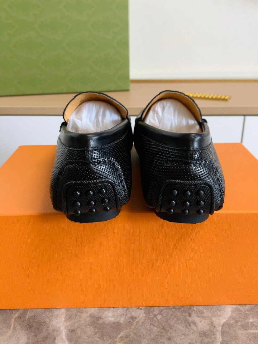 Louis Vuitton Black Textured Leather Loafers — back