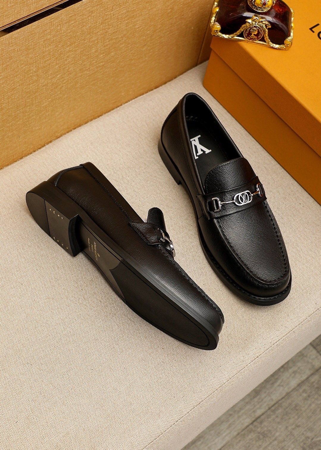 Louis Vuitton Black Textured Metal-Bit Loafers — front