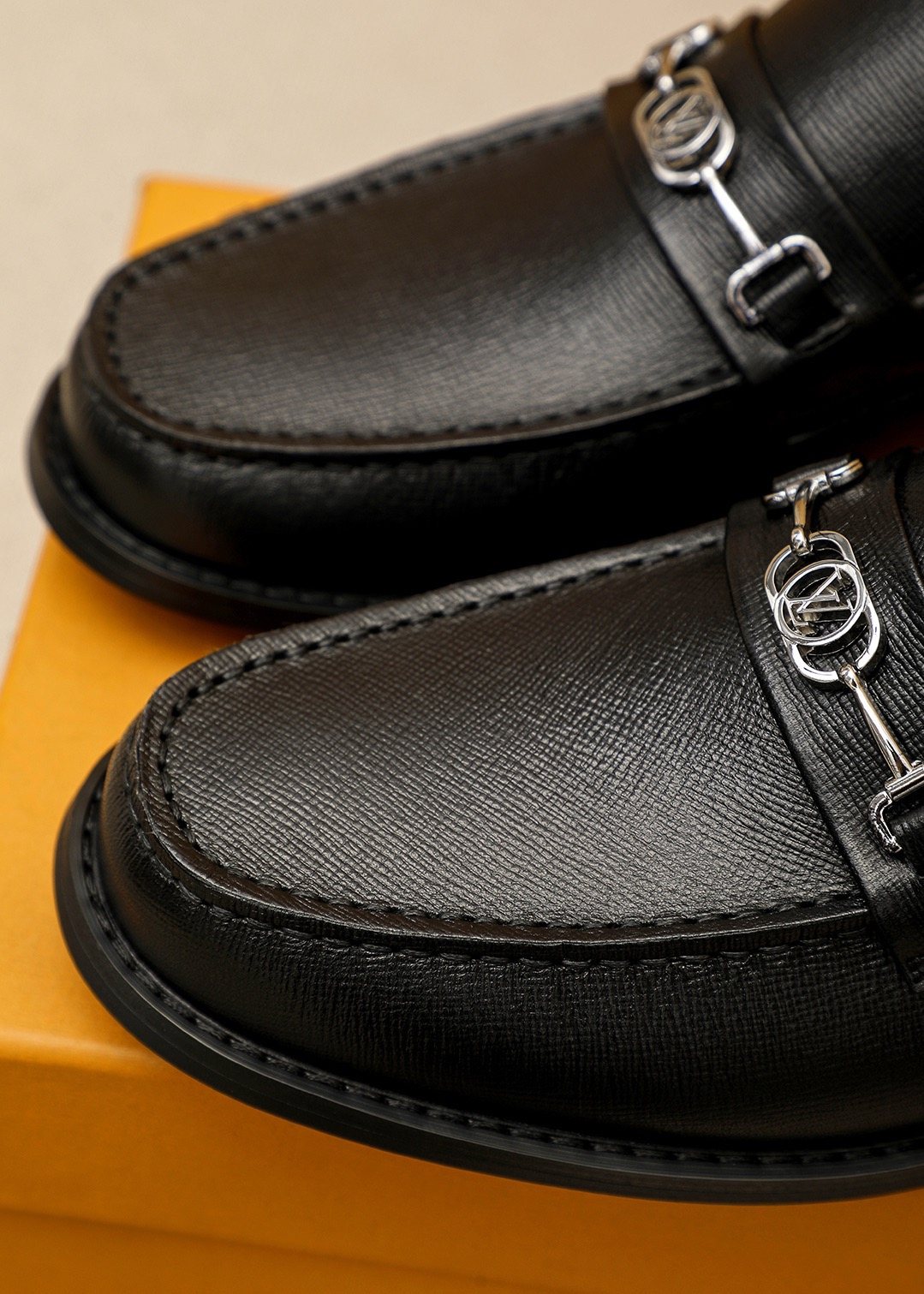 Louis Vuitton Black Textured Metal-Bit Loafers — detail