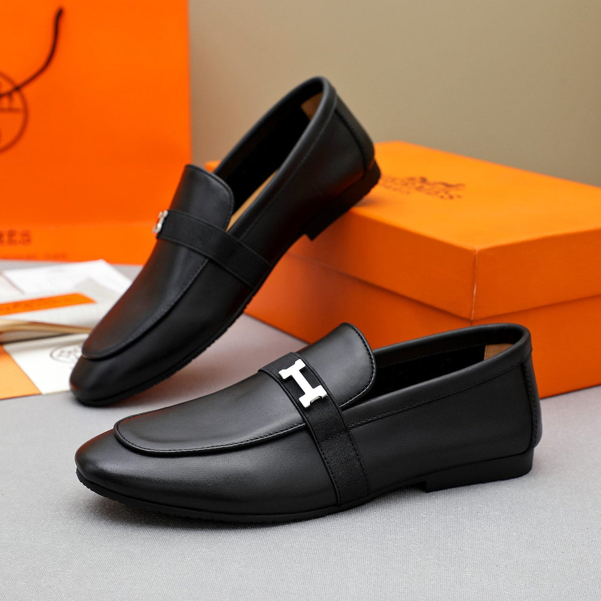 Hermès Black H-Hardware Slip-On Loafers — side