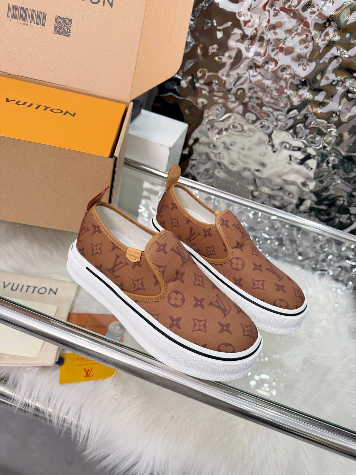 Louis Vuitton Brown Monogram Slip-On Sneakers — side