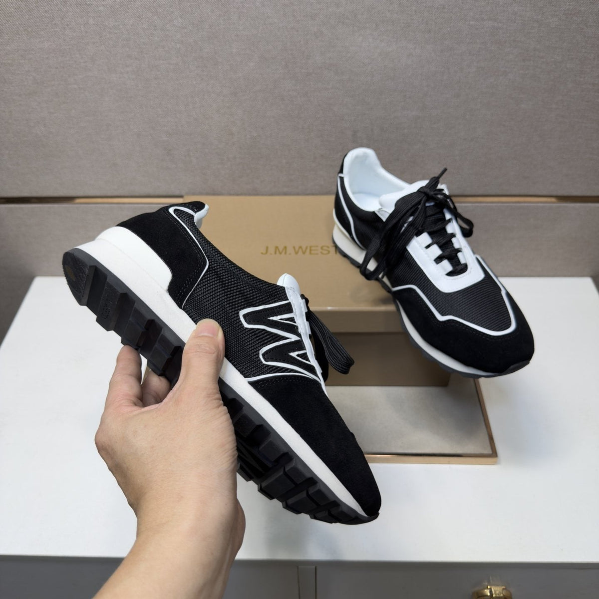 J.M. Weston Black and White Panel Sneakers — detail