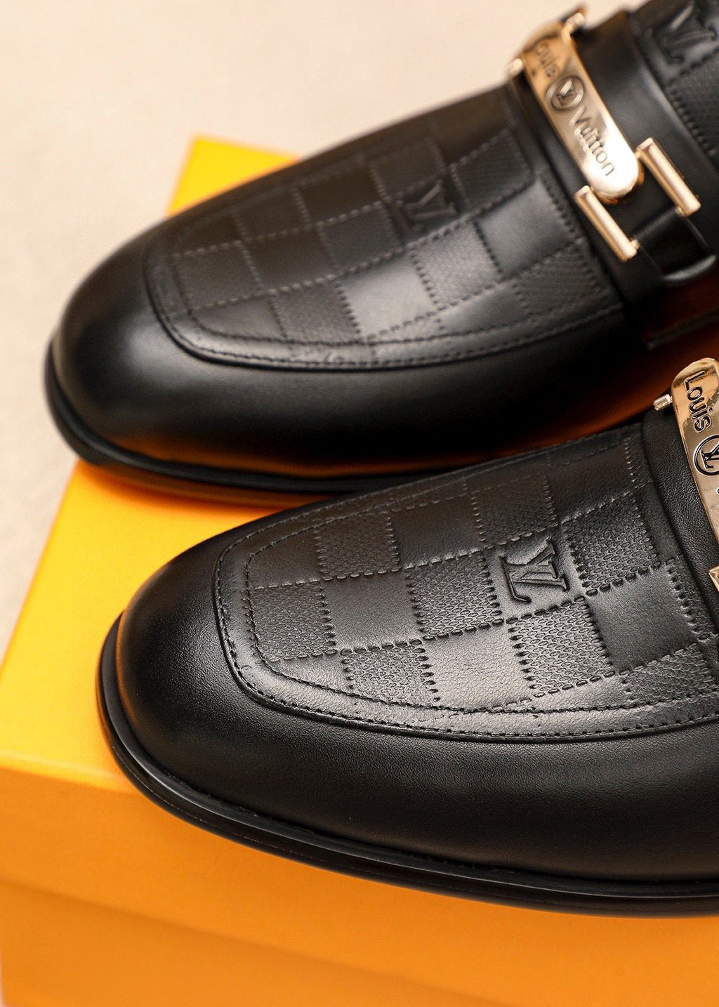 Louis Vuitton Black Embossed Loafers — front