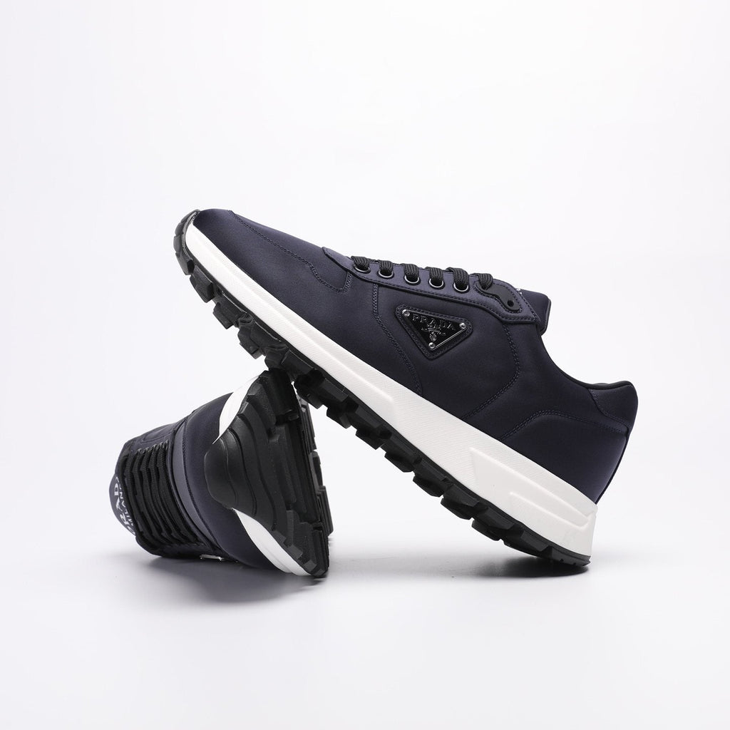 PRADA Navy Triangle Badge Sneakers — side