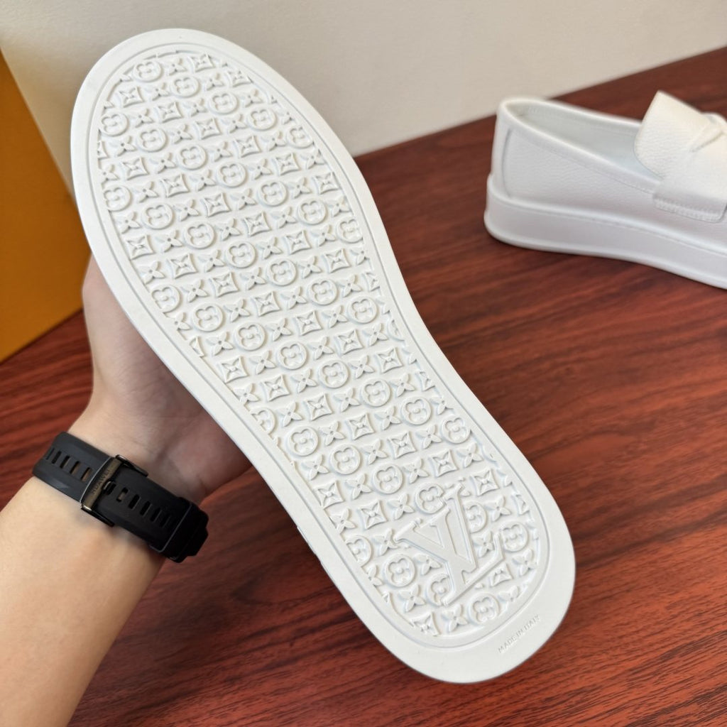 Louis Vuitton Textured Slip-On Loafers — detail