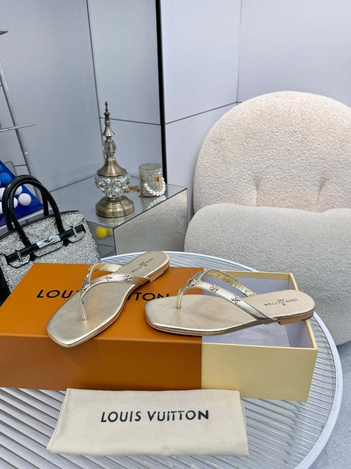 Louis Vuitton Metal-Detail Thong Sandals — front